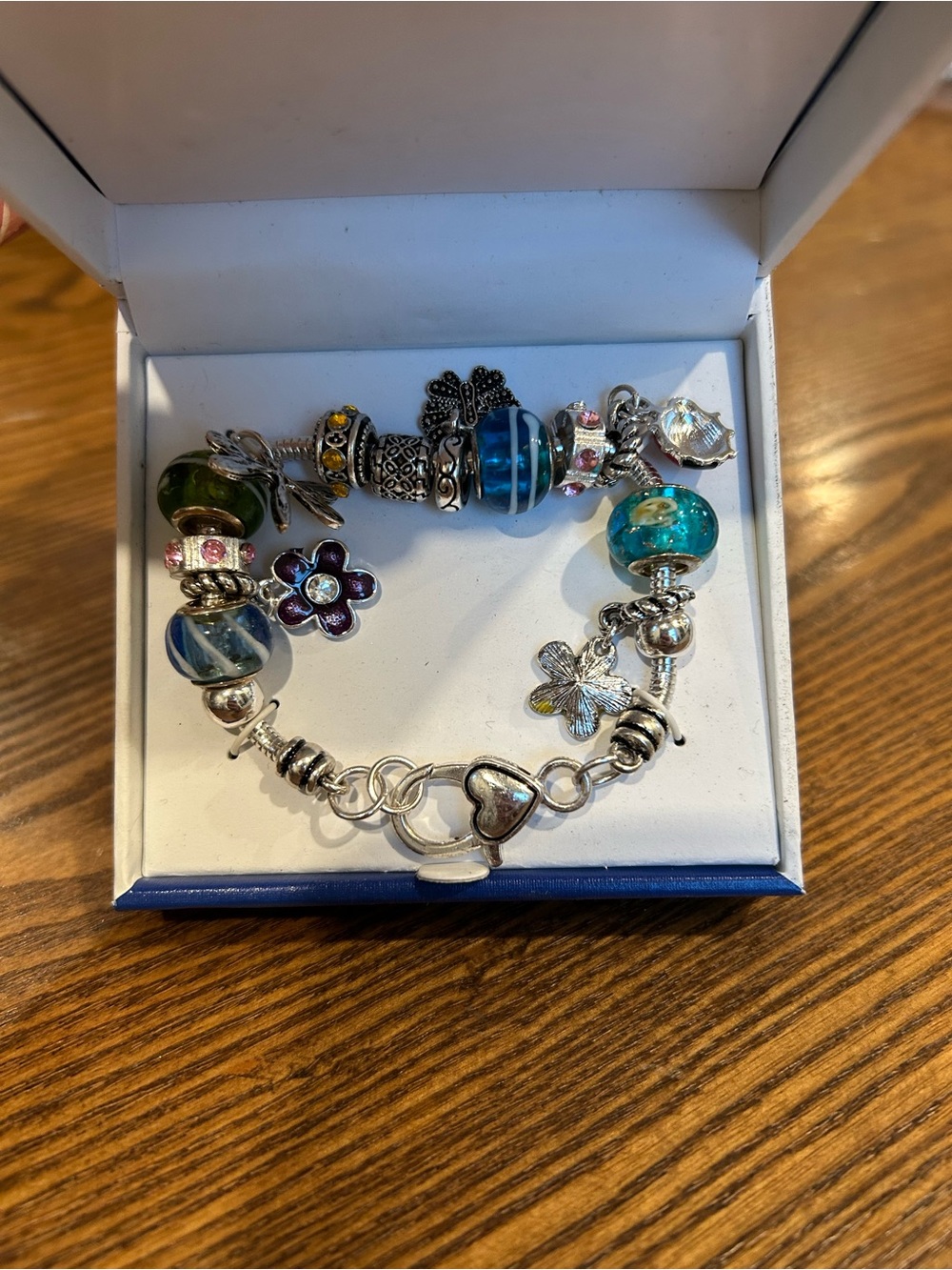 Silver Charm Bracelet with Blue and Teal Glass Beads
